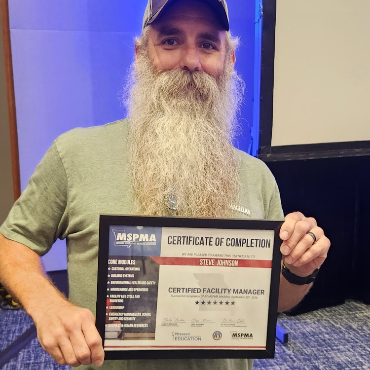 man holding certificate