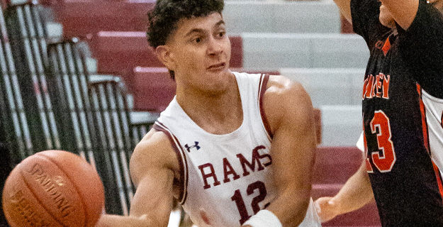 Student playing basketball.