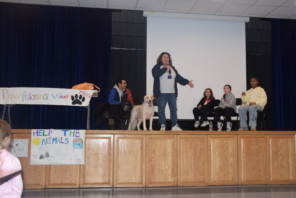 Representatives from the Town of Hempstead Animal Shelter collaborated with fourth graders at Parkway Elementary School in East Meadow to help them kick off their weeklong PawPalooza celebration on March 23.