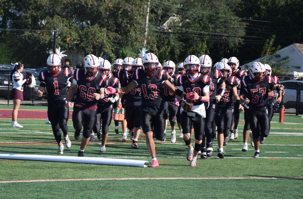 Blue skies and Ram pride define W.T. Clarke High School’s homecoming Football team running out