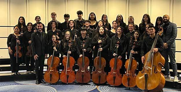 East Meadow music students with their instruments.