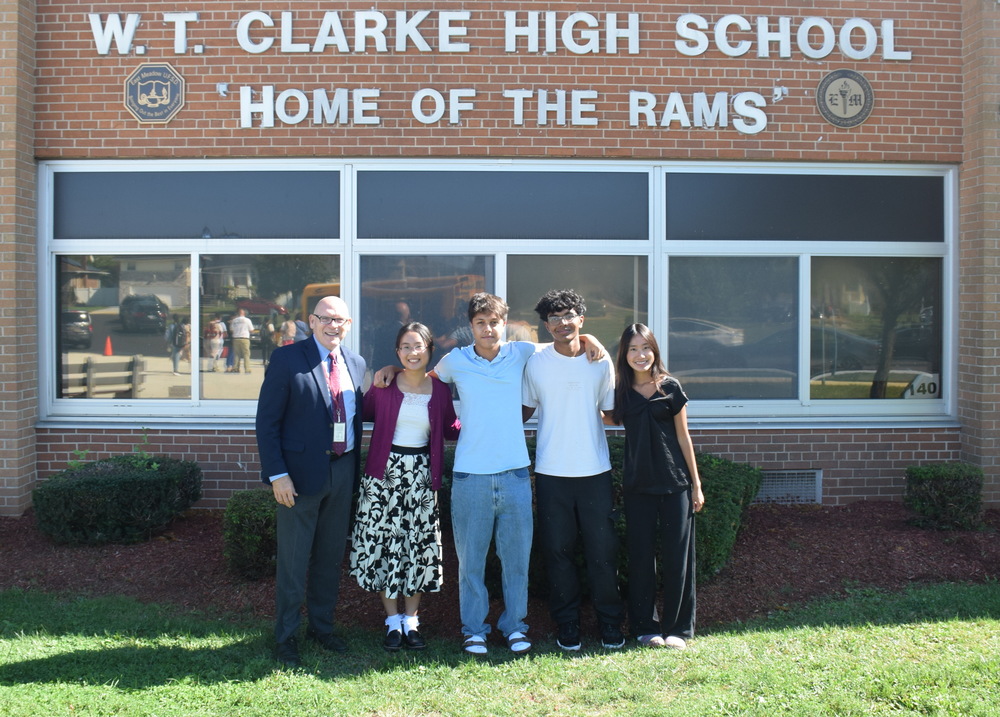 students outside in front of school