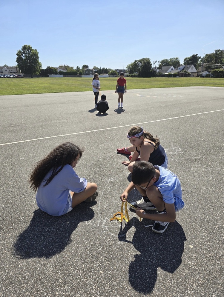 5th Graders investigating shadows