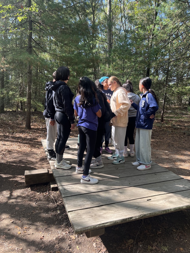 Students in a group challenge.