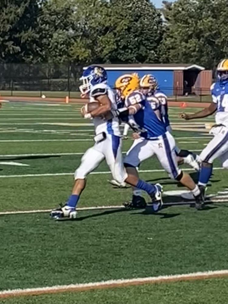 East Meadow football tackle