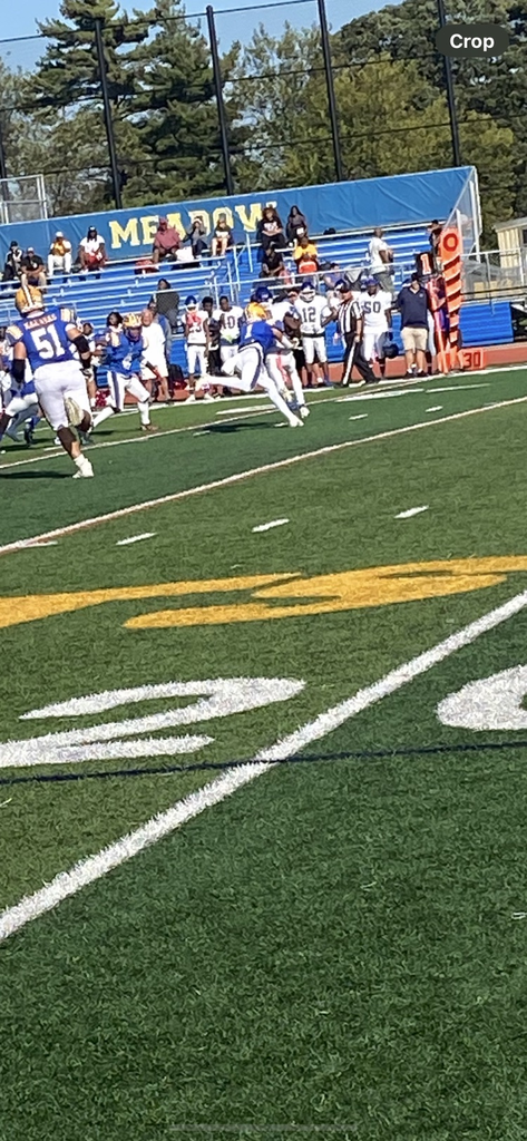 east meadow football defense