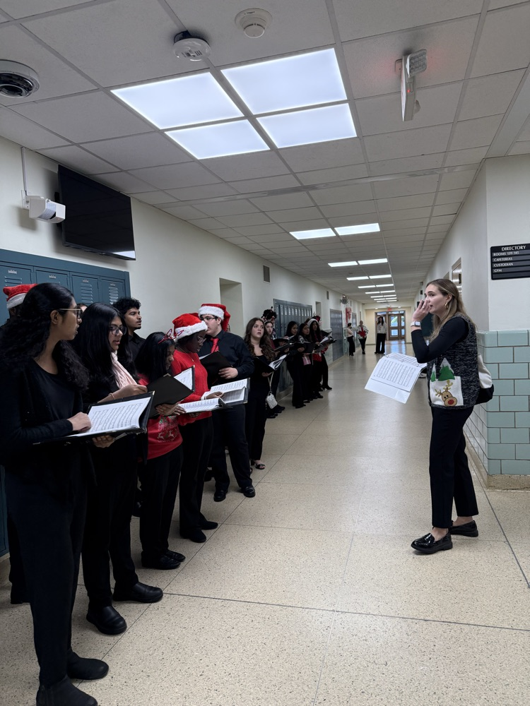 EMHS Chamber choir sings in the hallways!