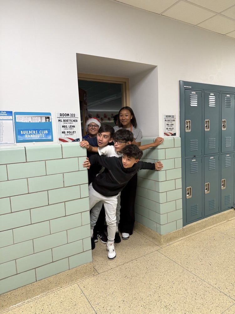 Students hear carolers on the hallway!