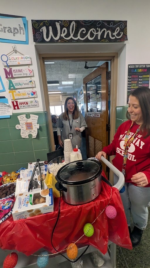 spirit committee handing out hot chocolate