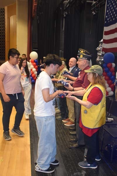 Student musicians at both high schools performed numerous songs to recognize all of the veterans in attendance.
