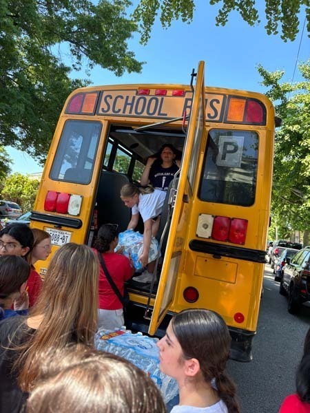 Woodland Middle School’s annual Stuff A Bus event reflects the school community’s ongoing commitment to service. 