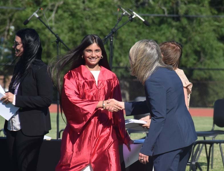 Eighth grade students at Woodland Middle School in East Meadow commemorated the culmination of their middle school years during the school’s moving-up ceremony held at the Salisbury School. 