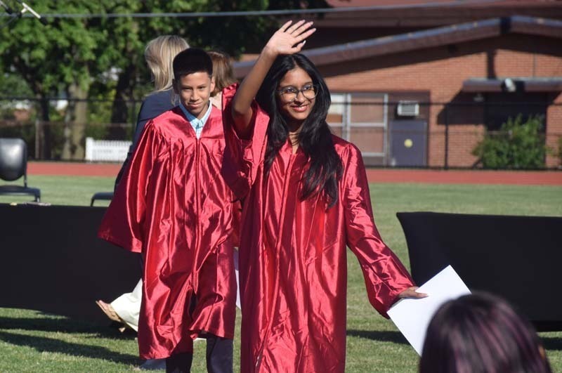 Eighth grade students at Woodland Middle School in East Meadow commemorated the culmination of their middle school years during the school’s moving-up ceremony held at the Salisbury School. 