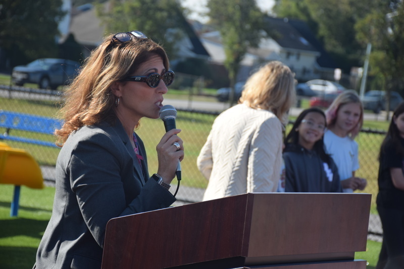 Playground ribbon cutting ceremony group photo