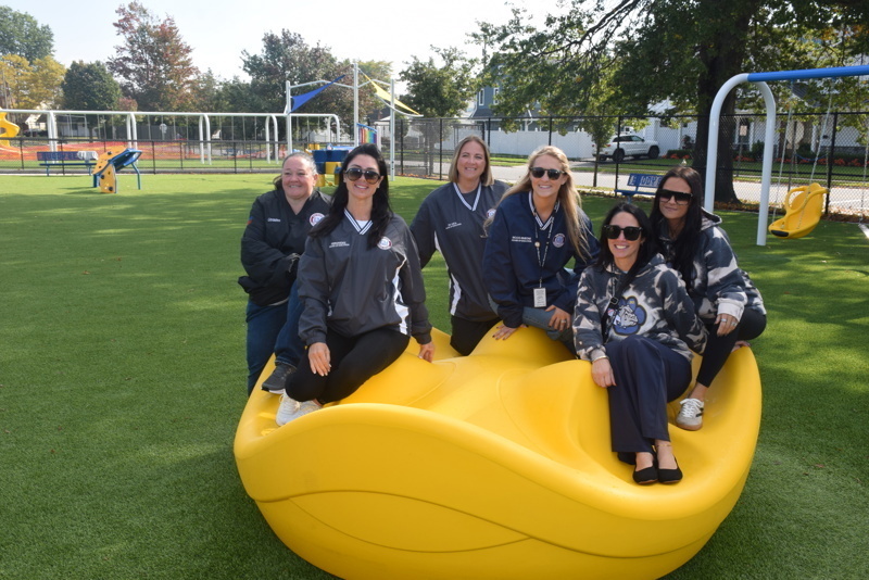 Playground ribbon cutting ceremony group photo
