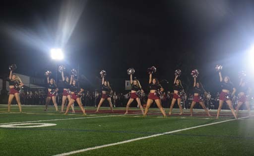The Rams varsity cheerleaders entertained the crowd throughout the homecoming game.    