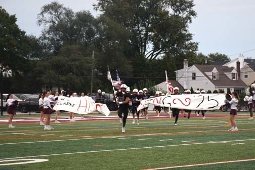 The Rams marching band and flag corps paraded down Washington Avenue. 