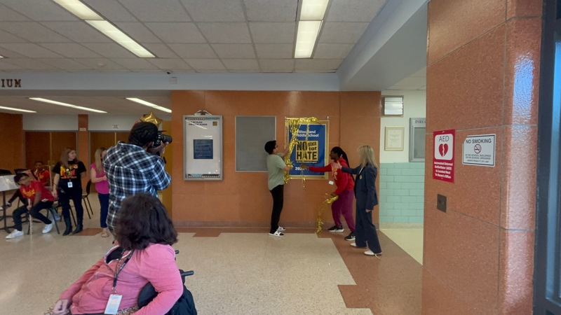 The installation of the new banner
