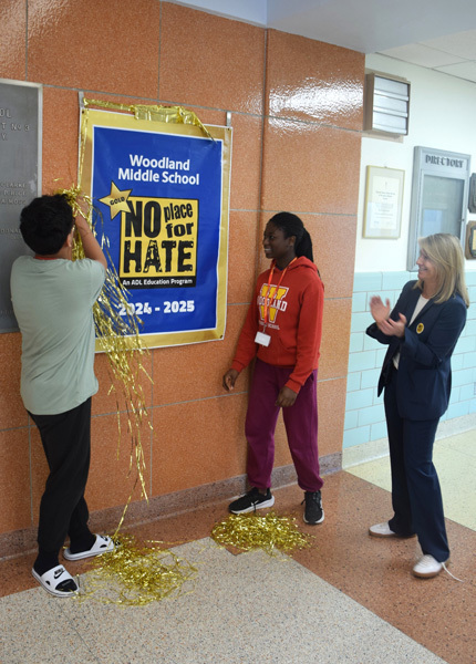 4: Students also unveiled their No Place for Hate gold star status banner. 