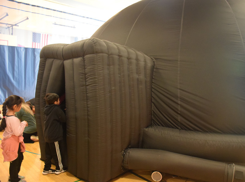 students in planetarium