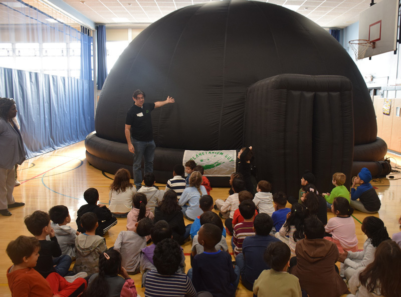 students in planetarium