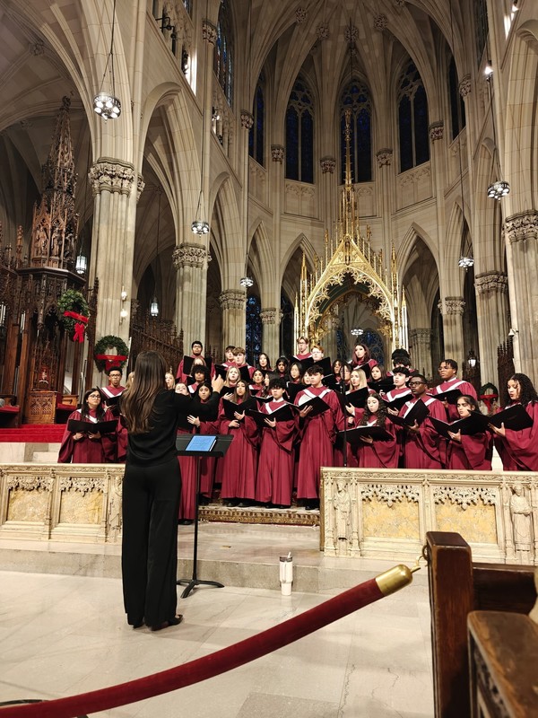 Students performing in cathedral.