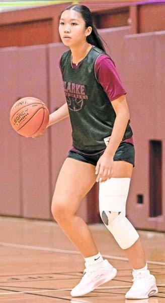 Student playing basketball