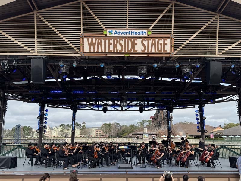 Students standing on stage.