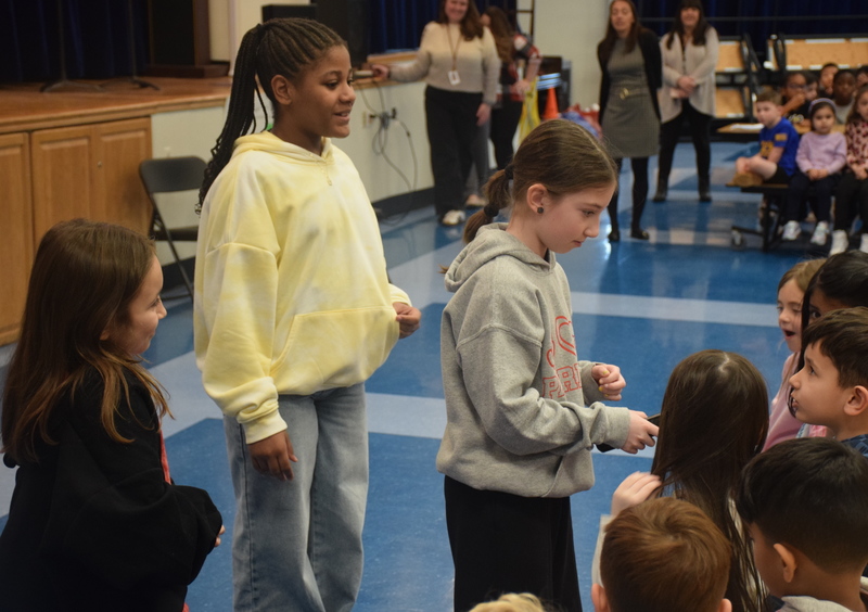 After the assembly, students got to meet two dogs, Cooper and Penny, from the town’s animal shelter. 