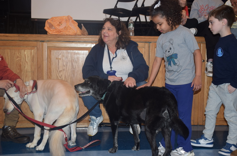 After the assembly, students got to meet two dogs, Cooper and Penny, from the town’s animal shelter. 