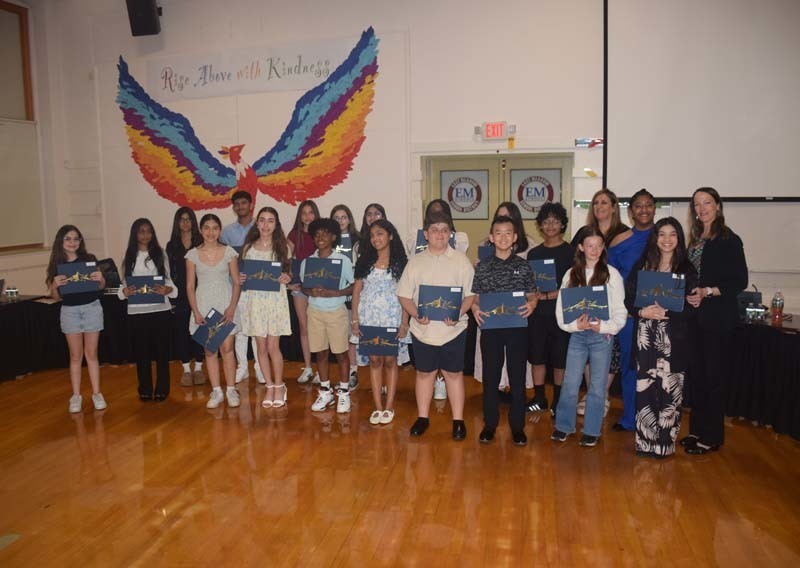 Group photo of students holding awards.