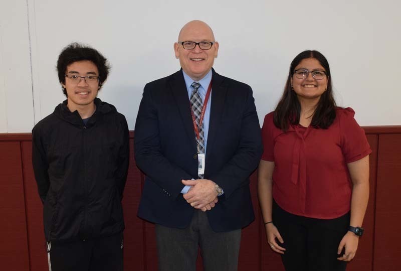 Finalists smiling with one other Finalists smiling with one other