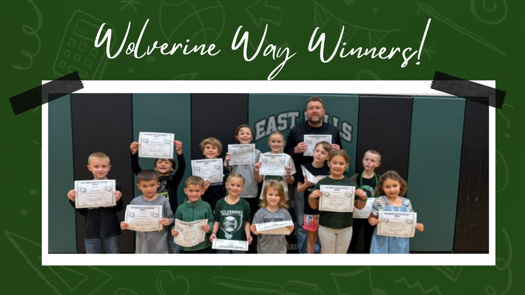 Students smiling, holding their certificates