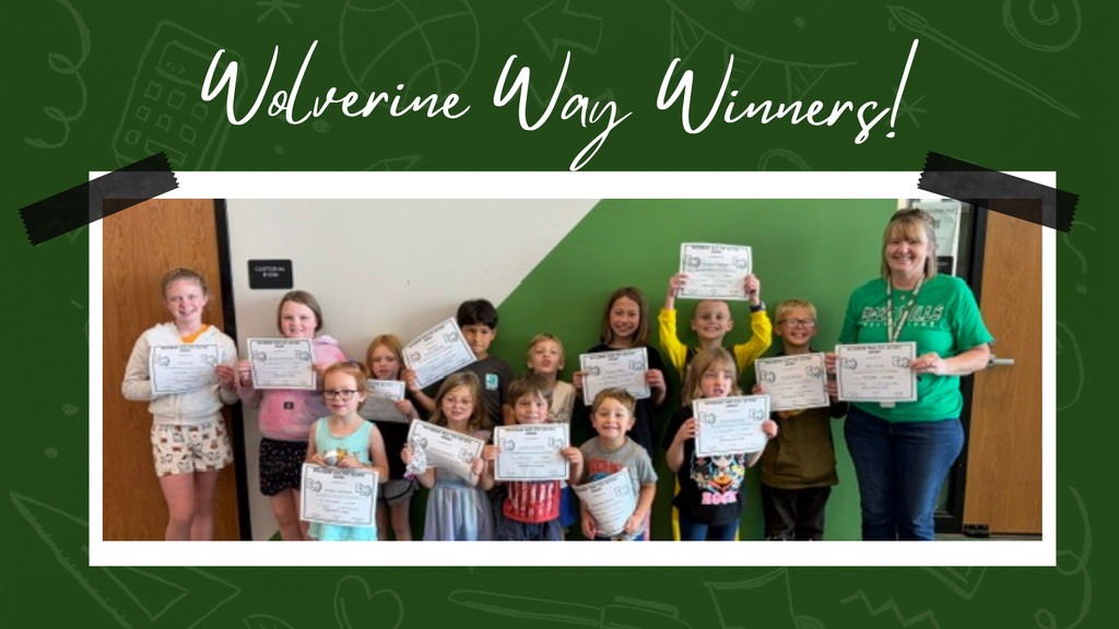 Students smiling, holding their certificates