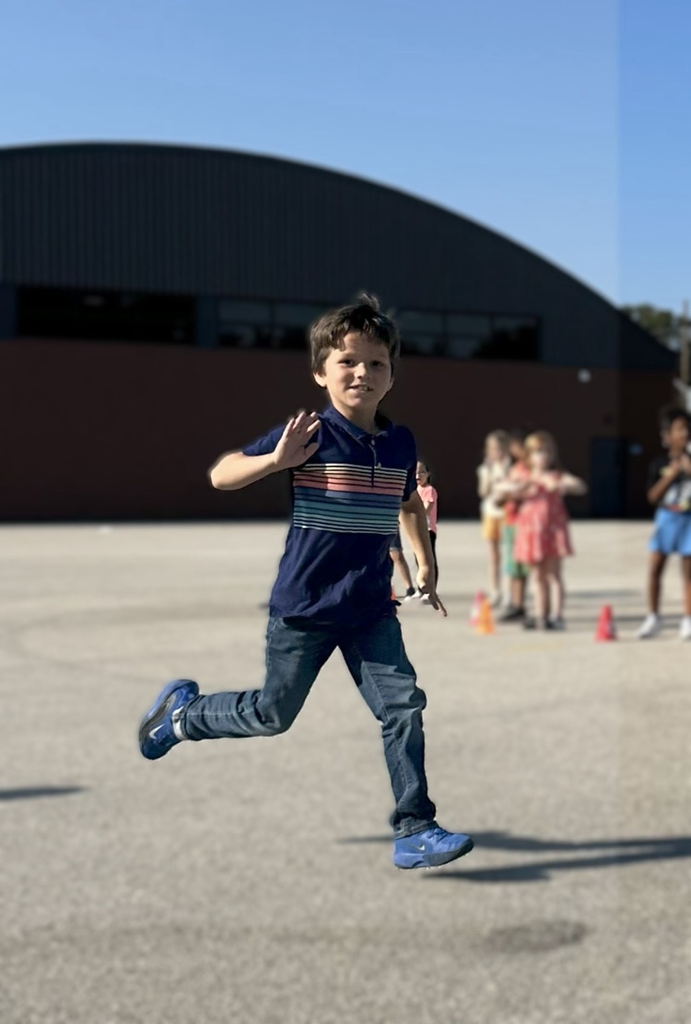 photo of students running/playing