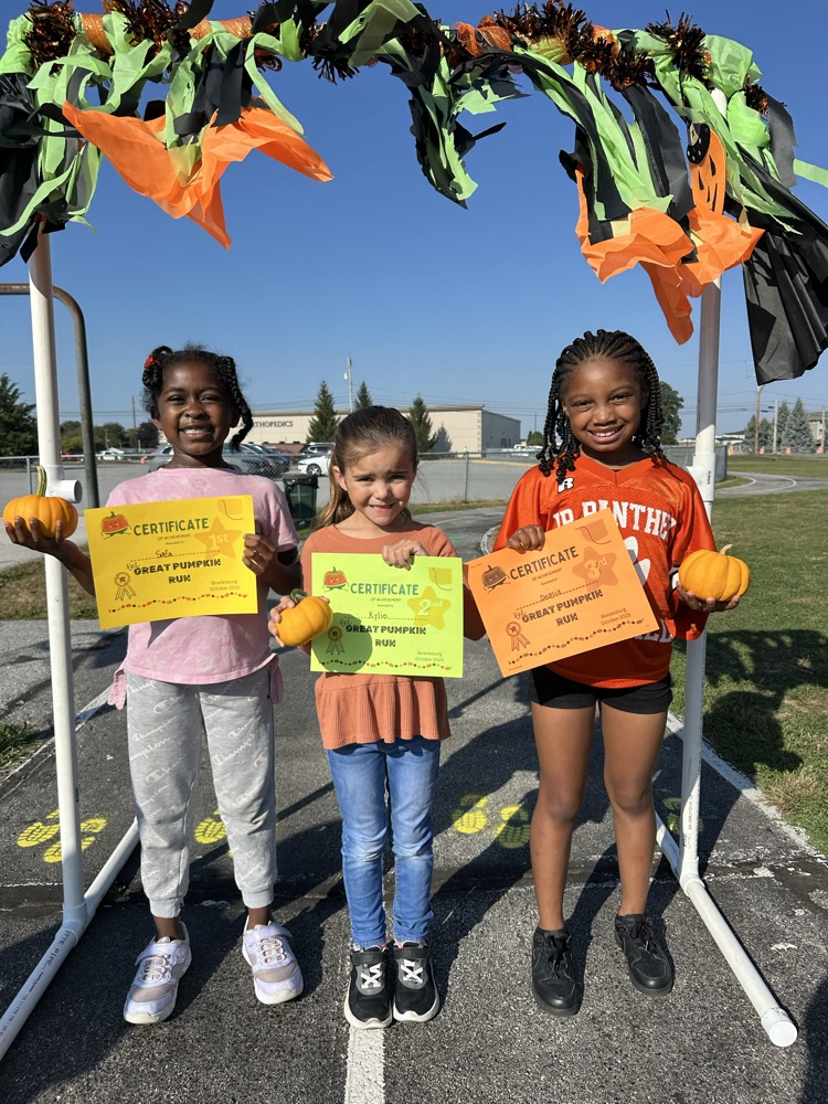 photo of students running/playing