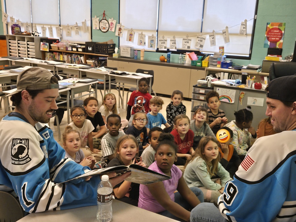 Students listening to the story