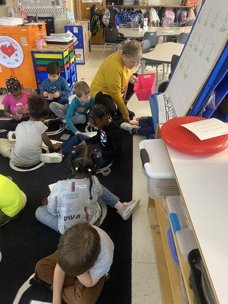 Mrs. King helping her students.