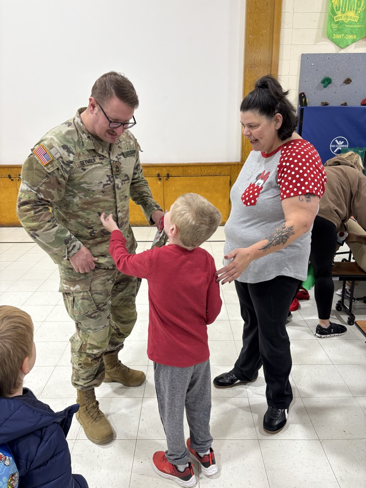 students meeting veterans