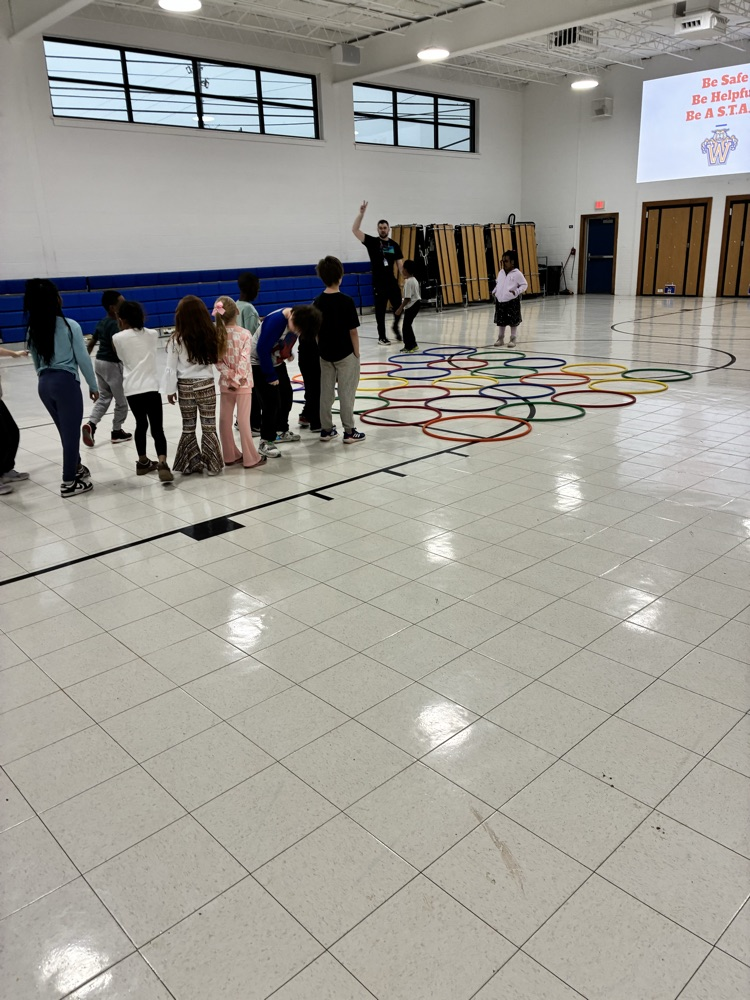 students moving in PE 