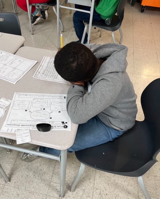 Student working on writing.