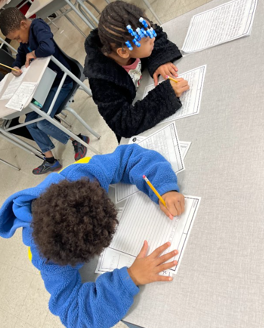 Students working on writing.