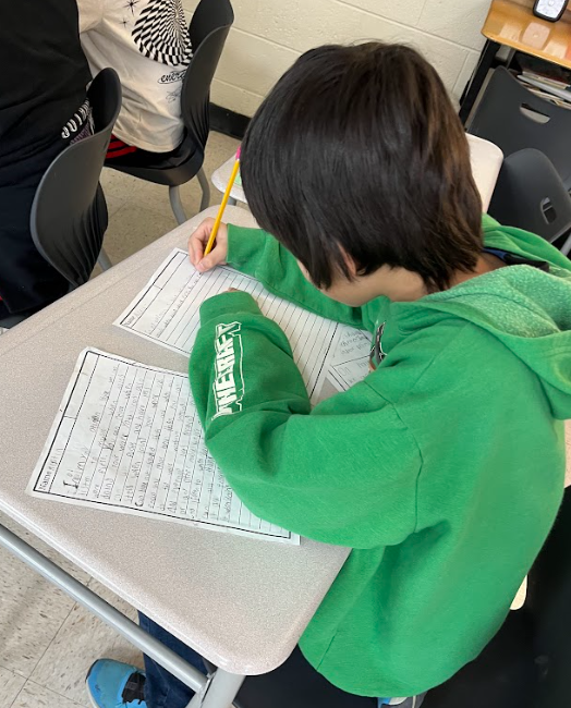 Student working on writing.