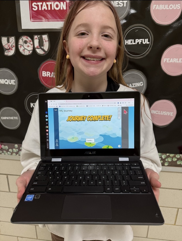 These students in Mrs. Lagerstam's class have finished ST Math. They are holding their certificate.