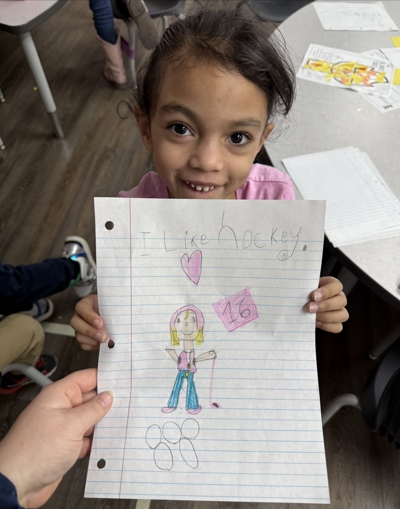 Student showing off their work