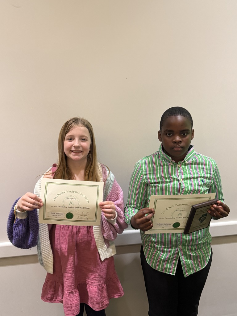 Sarah and Rabbison with awards