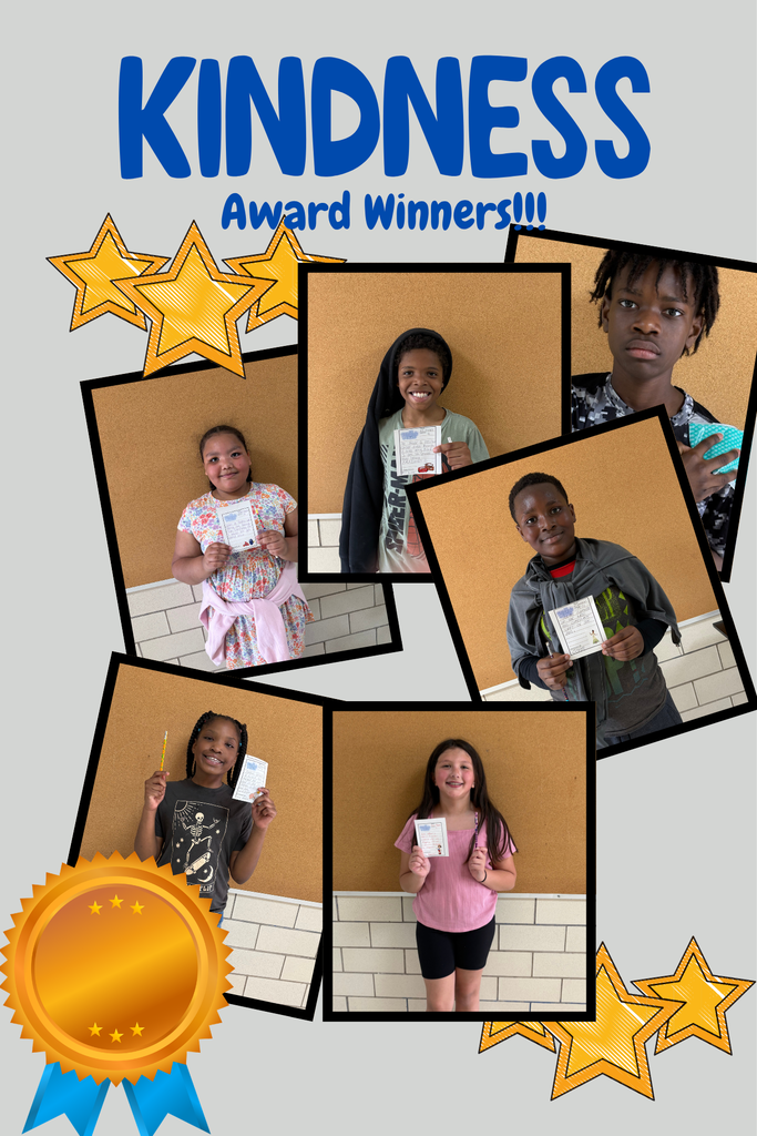 Wells Students showing  their kindness award.