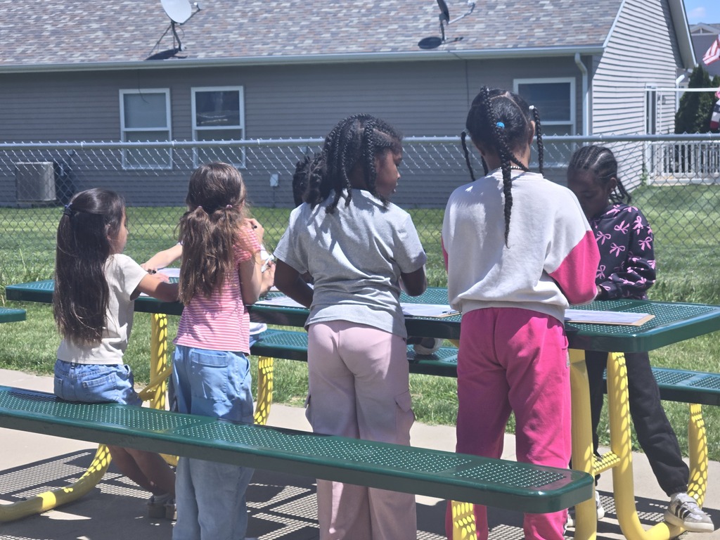 Students playing Phonics bingo outside!