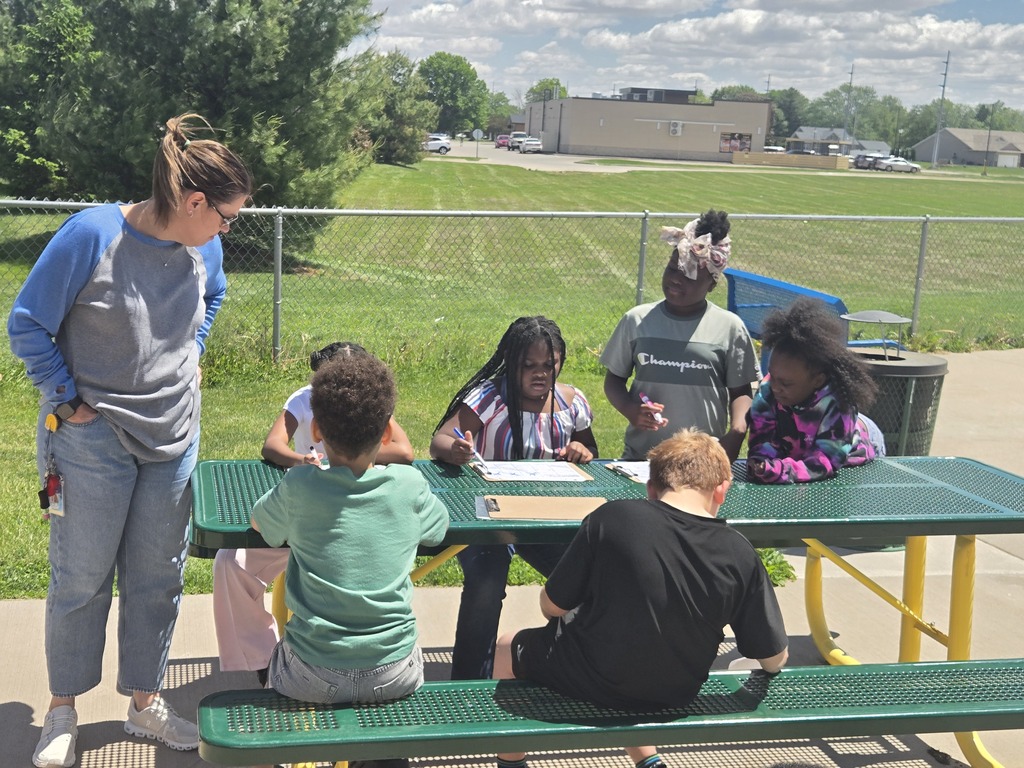 Students playing Phonics bingo outside!