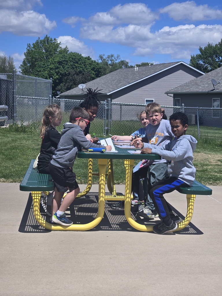 Students playing Phonics bingo outside!
